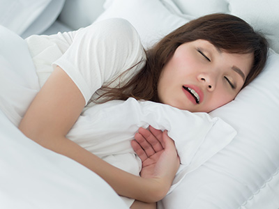 Tired exhausted stressed woman snoring portrait of stressful exhausted woman snoring while sleeping on bed in bedroom environment health mental care medical concept asian adult woman model, Kary Dental